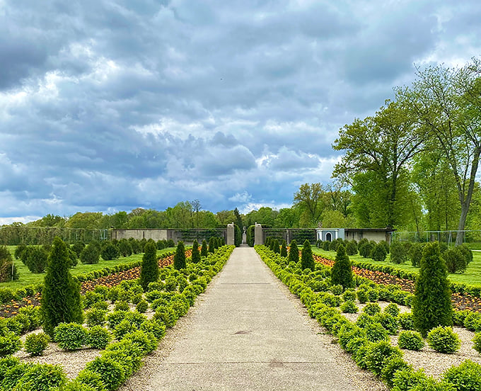 A garden path to serenity! Perfectly manicured hedges and vibrant flowers create a living tapestry, inviting you to stroll and unwind. Photo credit: Allerton Park & Retreat Center