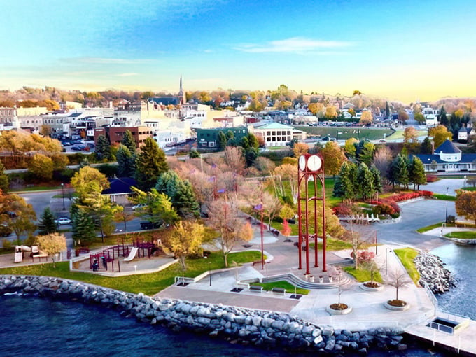 Petoskey: Where nature and nostalgia collide! This aerial view showcases a waterfront that's more inviting than grandma's apple pie.