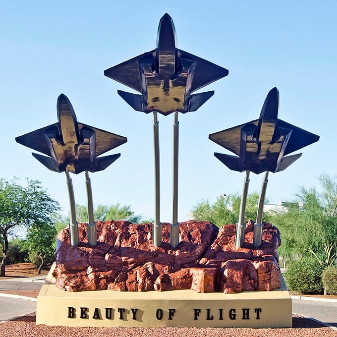 The 'Beauty of Flight' sculpture: Where art meets aerodynamics. It's like a metal ballet, frozen mid-pirouette against the Arizona sky.