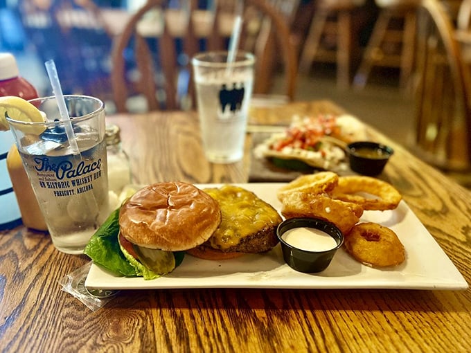 Yeehaw! This burger's stacked higher than a cowboy's tall tale. One bite and you'll be riding high in the saddle of flavor country.