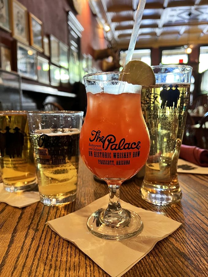 Sunrise in a glass! This margarita's got more zing than a rattlesnake's tail. One sip and you'll be seeing the world through rose-colored cactus glasses.