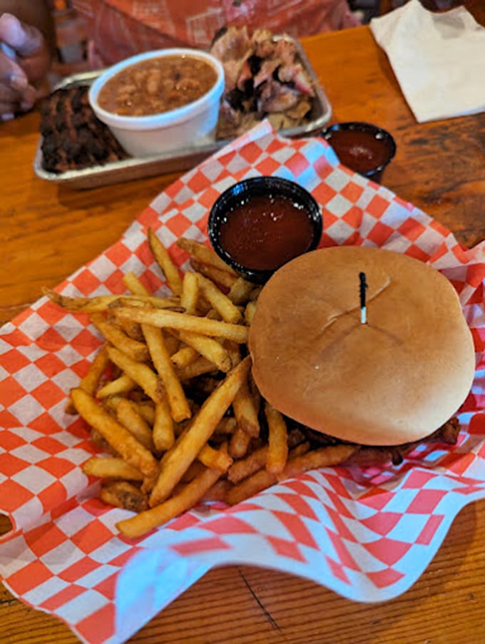 Yeehaw! This pulled pork burger's piled higher than a rodeo cowboy on his trusty steed. Giddy up and dig in!