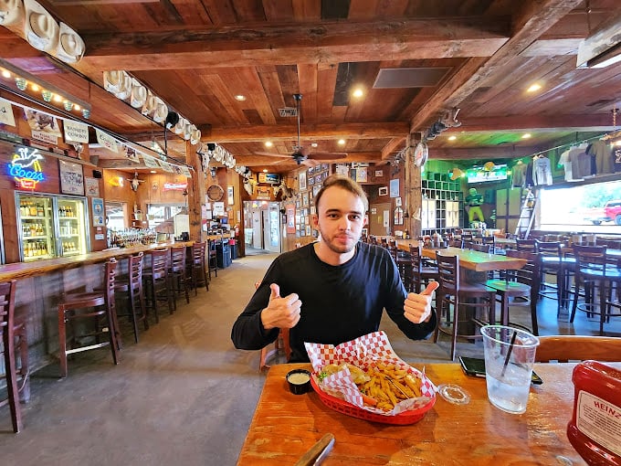 Smile if you love comfort food! This happy camper's got a basket of fried goodness that'd make even a cactus grin.