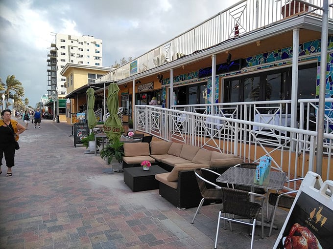 Al fresco living room: Comfy outdoor seating invites you to linger, people-watch, and perfect the art of doing absolutely nothing.