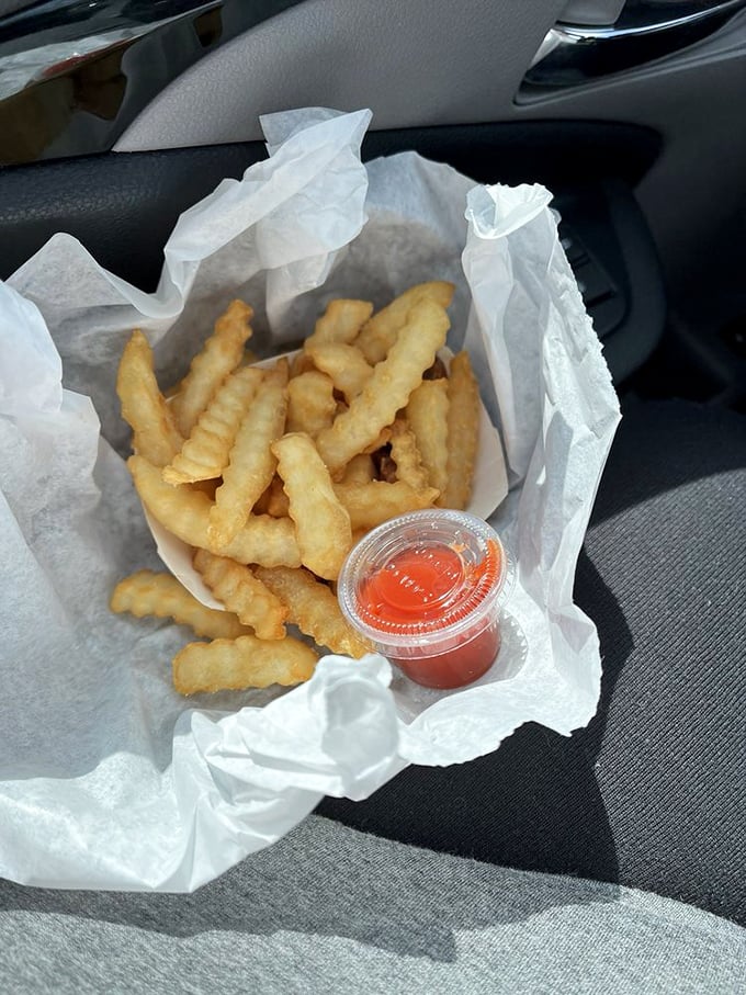 Crinkle-cut perfection! These golden fries aren't just a side dish, they're a crispy, salty work of art. Ketchup optional, but highly recommended.