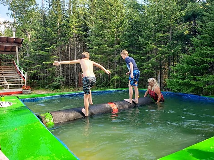 Lumberjack boot camp or the world's most exciting balance beam? Either way, these kids are living every treehouse builder's dream.