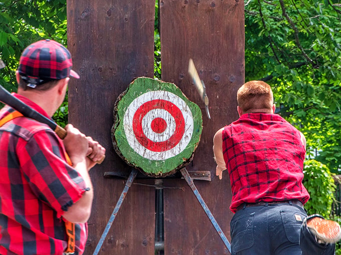 Bullseye! It's like darts on steroids. These axe throwers could probably split a hair on a gnat's behind from 50 paces.