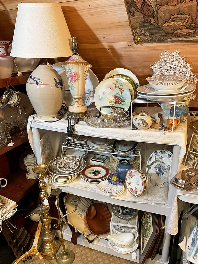 Grandma's kitchen called, and it wants its charm back! This display of vintage kitchenware is serving up nostalgia with a side of functionality.