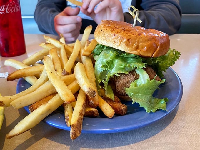 The haddock sandwich: Where fish meets its crispy destiny. Neptune himself would trade his trident for a bite.