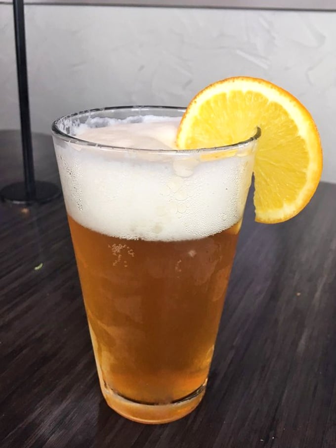 Cheers to beers! This frosty glass of amber goodness is the perfect sidekick for your burger adventure. It's like liquid courage for your taste buds.