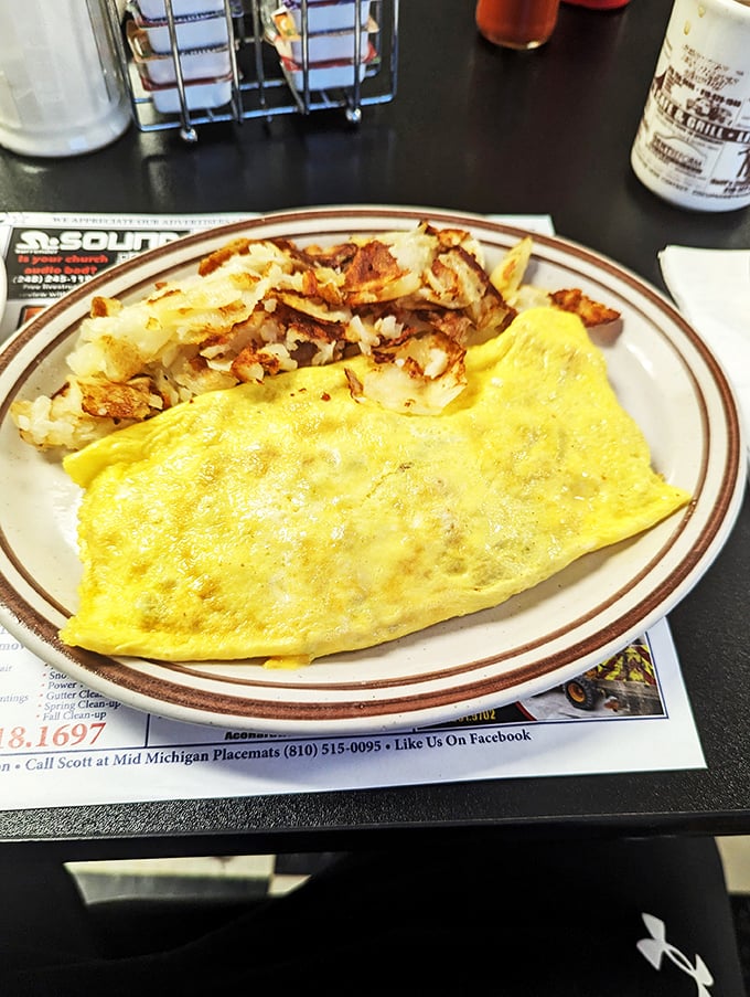 Yellow submarine? Nope, just the cheesiest, most golden omelet this side of the Mississippi. Dive in, taste buds first!