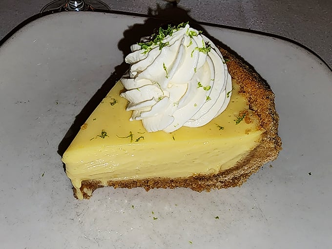 Pucker up, buttercup! Murray's key lime pie is a zesty dance of sweet and tart, topped with a cloud of whipped cream.