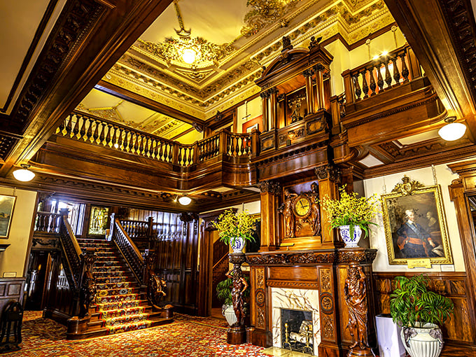 Wood paneling that puts your grandpa's den to shame. This foyer screams "old money" louder than a Monopoly champion.