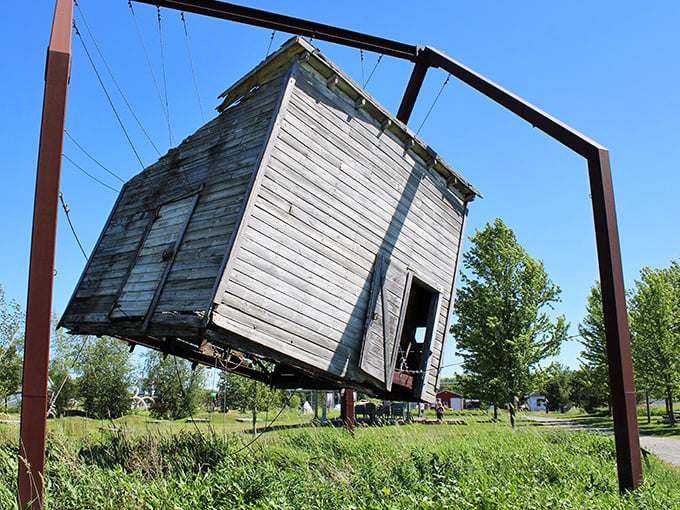 "Home is where the art is." This tilted house sculpture challenges our perception of stability, making us wonder if we've had one too many Minnesota hotdishes.