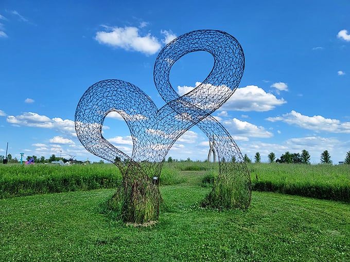 "Clouds, meet your match." This ethereal sculpture seems to dance with the sky, giving new meaning to the phrase 'head in the clouds.'