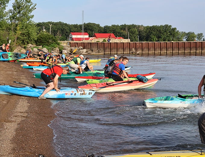 "Paddle power in action! These kayakers are living their best 'Life of Pi' moments, minus the tiger and existential crisis."