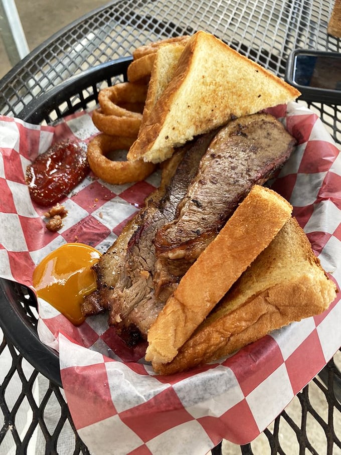 Brisket so tender, it falls apart faster than your New Year's resolutions. Paired with golden toast, it's a carnivore's dream come true.