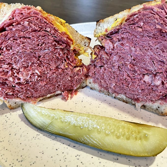 The Leaning Tower of Delicious! Slyman's corned beef sandwich, sliced so thin it practically melts, is a masterpiece of meaty architecture.