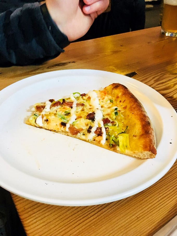 One slice to rule them all! This pizza looks so good, it might just make you forget your own name. But that's okay - you only need to remember how to say "More, please!"