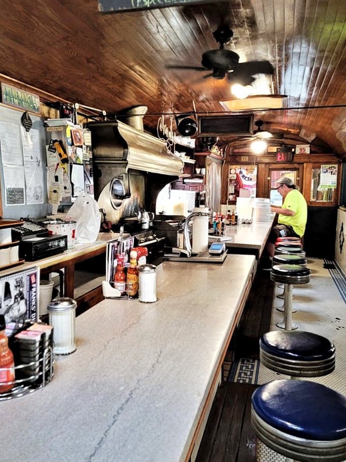 Where the magic happens: a glimpse into the bustling heart of Franks Diner, where short-order cooks perform culinary acrobatics with spatula in hand.