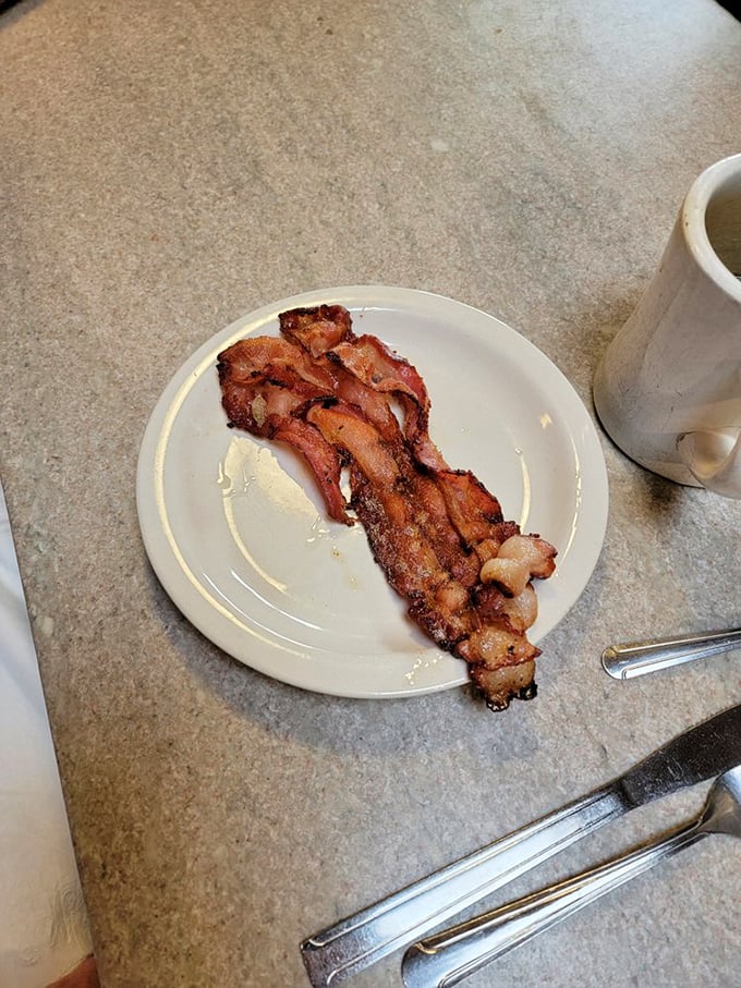 Bacon: nature's candy. Crispy, smoky, and irresistible – it's the breakfast side that thinks it's the main event. And at Franks Diner, it just might be!