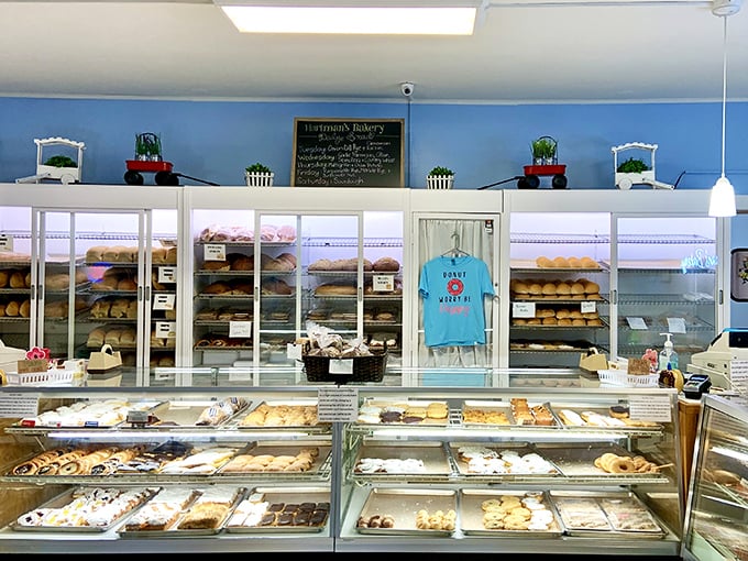 Behold, the great wall of pastry! This counter is like a museum of edible art, showcasing Wisconsin's finest floury masterpieces.