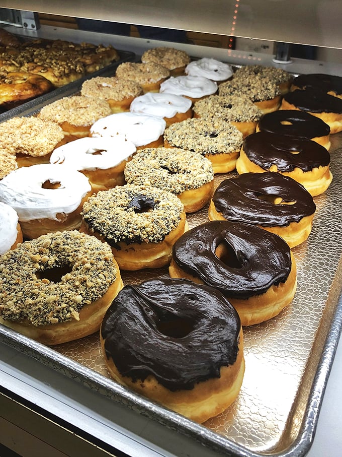 Chocolate lovers, rejoice! These donuts look so decadent, they might just make you break into a happy dance right there in the bakery.