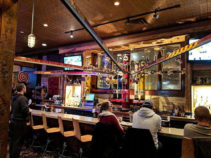 Pull up a chair and stay awhile! AJ Bombers' bar area is where burger dreams and cold brews come true.