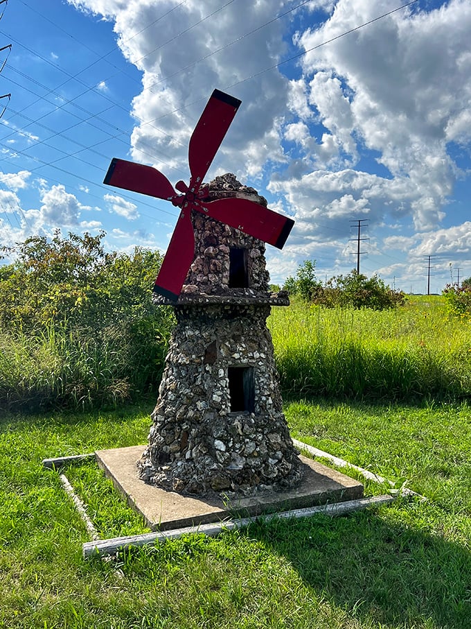 Don Quixote would feel right at home tilting at this whimsical windmill. Just watch out for those giant red blades!