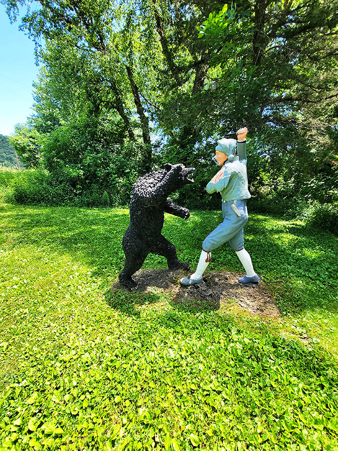 Man vs. Bear: The ultimate dance-off. This sculpture captures the moment right before the bear busts out its moonwalk.