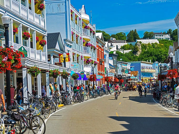 Main Street, Mackinac Island: A colorful parade of shops, bikes, and fudge-induced smiles. It's summer camp for grown-ups!