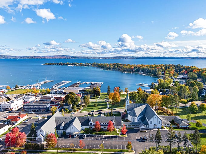 Harbor Springs: Where the water's so blue, it makes the Caribbean jealous. This town is prettier than a Bob Ross painting come to life.