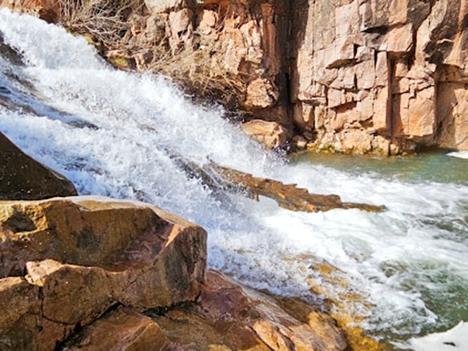 Nature's own water park! Slip, slide, and splash at Water Wheel Falls.