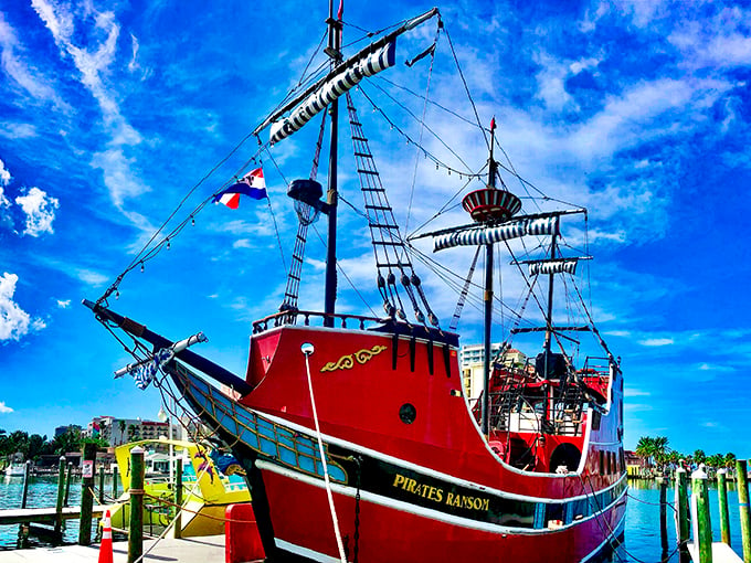 Ahoy, mateys! This crimson cruiser is redder than a sunburned pirate. Talk about sailing the scarlet seas!