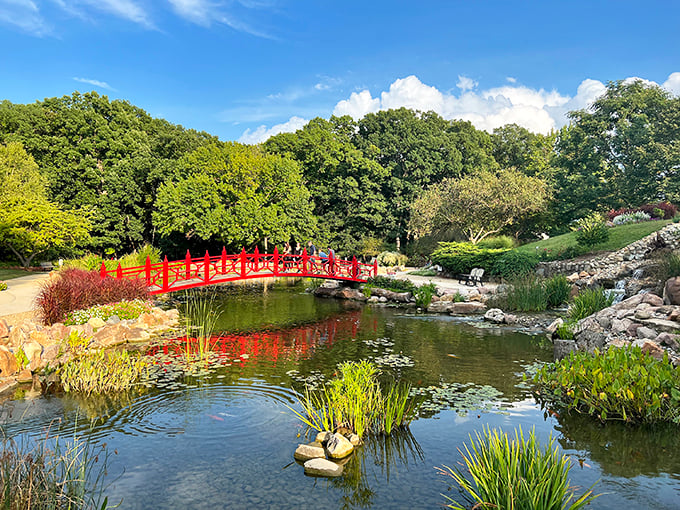 East meets Midwest in this tranquil oasis. The vibrant red bridge pops against lush greenery, creating a picture-perfect moment. Photo credit: Jeff Turner