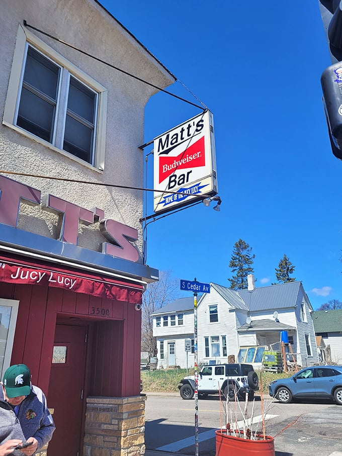 Dive into deliciousness! This no-frills bar serves up history and heart attacks, one cheese-stuffed patty at a time.