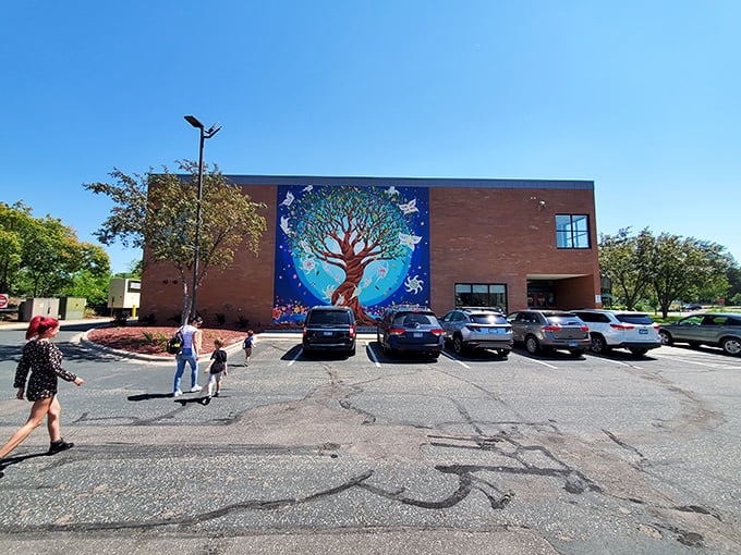 Mother Nature's artsy side on full display! This mural sets the stage for an arboreal adventure inside.