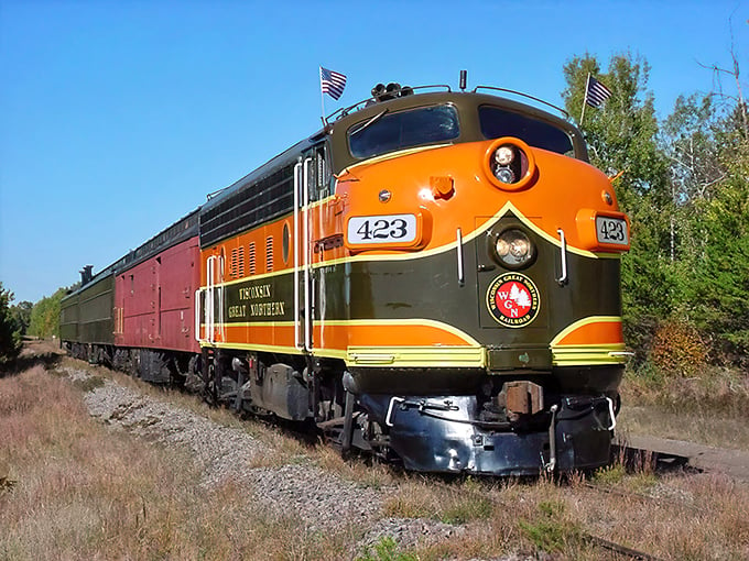 Orange you glad you stopped here? This vibrant locomotive is like a rolling sunset, ready for your next adventure.