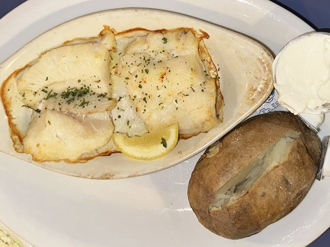 Flaky haddock draped in herb-flecked butter proves sometimes the simplest preparations yield the most heavenly results. Photo credit: Susan B.