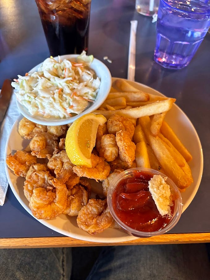 A feast fit for a fisherman: Crispy fried seafood paired with classic coleslaw and hand-cut fries. Photo credit: Eric Lanthier