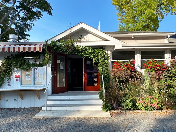 Journey's reward! This flower-framed doorway leads to a breakfast oasis worth seeking out.