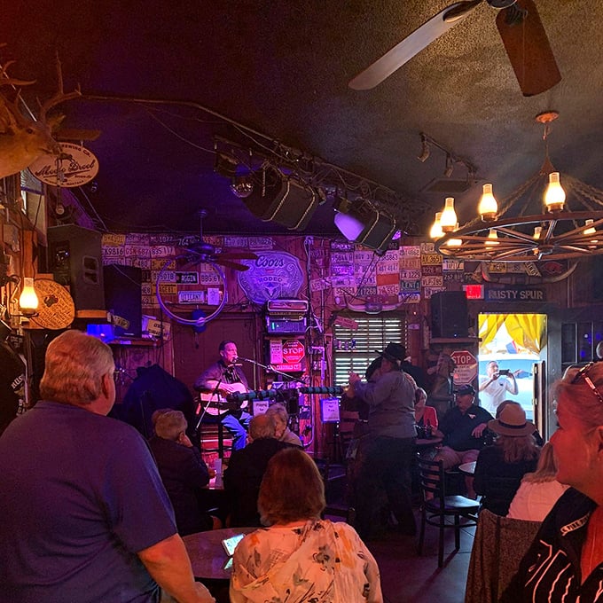 Dim lights, bright tunes—it's honky-tonk heaven! These folks are two-stepping their way into a night they might not remember, but'll never forget.