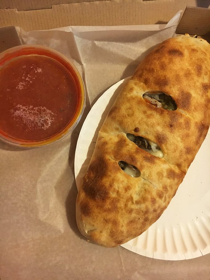 Sauce on the side? More like sauce on the ride to Flavortown! This stromboli is ready for its marinara dip.