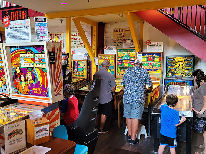 Generations unite in pixelated bliss! From silver-haired pinball wizards to wide-eyed youngsters, everyone's a kid again at these classic cabinets.