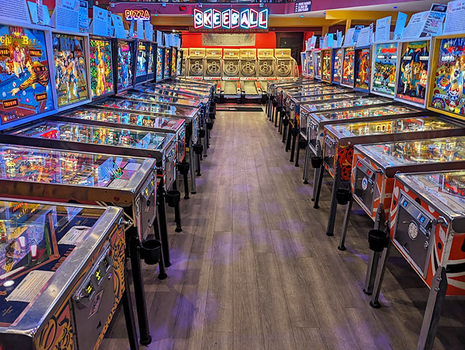 Flipper fingers at the ready! This mesmerizing array of pinball machines is like a time-traveling buffet of bleeps, bloops, and flashing lights.