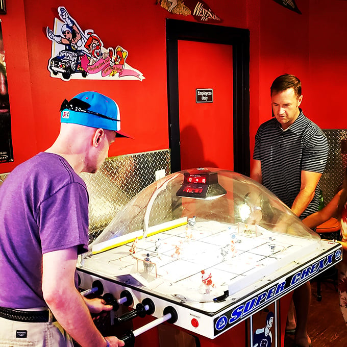 Ice hockey showdown! These players are locked in an intense battle of wits, reflexes, and tiny plastic athletes.