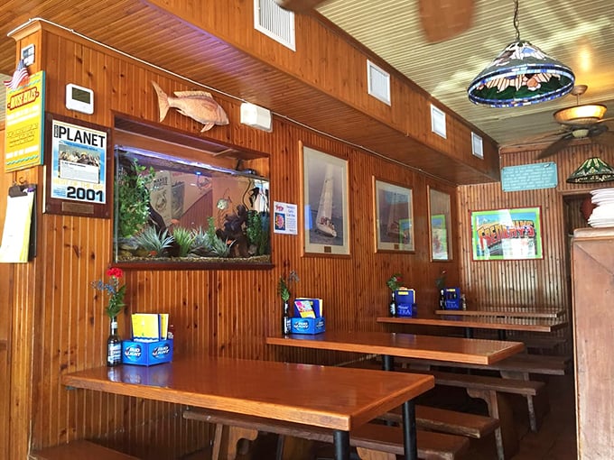 Dive into the deep end of deliciousness! Frenchy's dining area is a cozy cove of seafood treasures, complete with fish tank for ambiance.