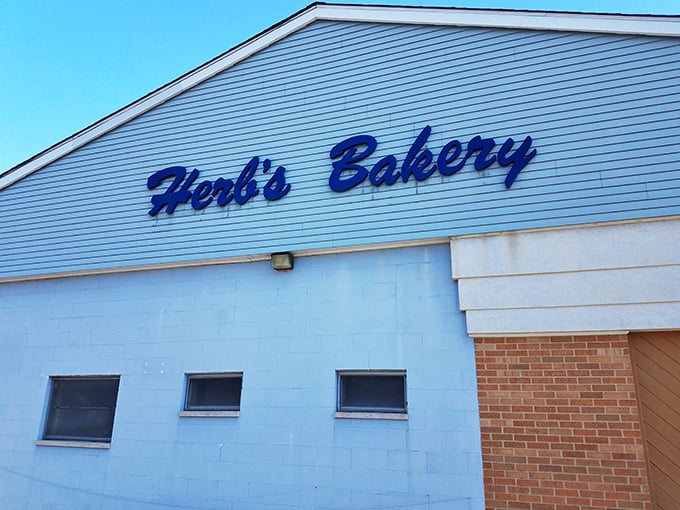 The sign says "Herb's Bakery," but we read it as "Heaven on Earth." Your diet's Kryptonite has an address, folks!