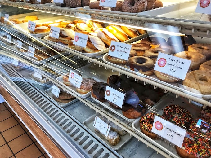 Behold, the wall of temptation! This display case is a real-life version of that dream where you're surrounded by desserts.