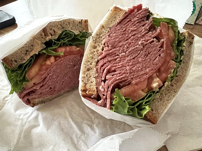 Meet the Eighth Wonder of the Deli World! This corned beef sandwich is so perfectly crafted, it deserves its own museum exhibit. Da Vinci's "Mona Lisa"? More like "Moaning with delight-sa"!